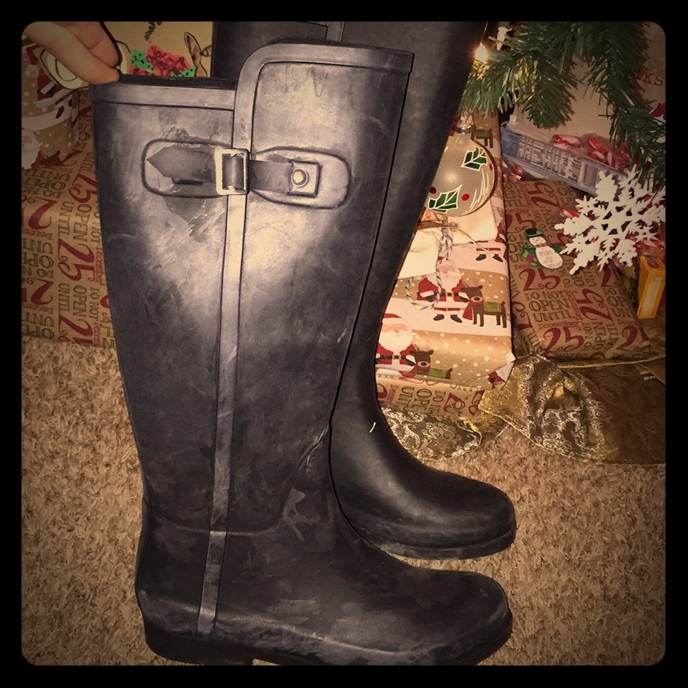 Knee high rain boots